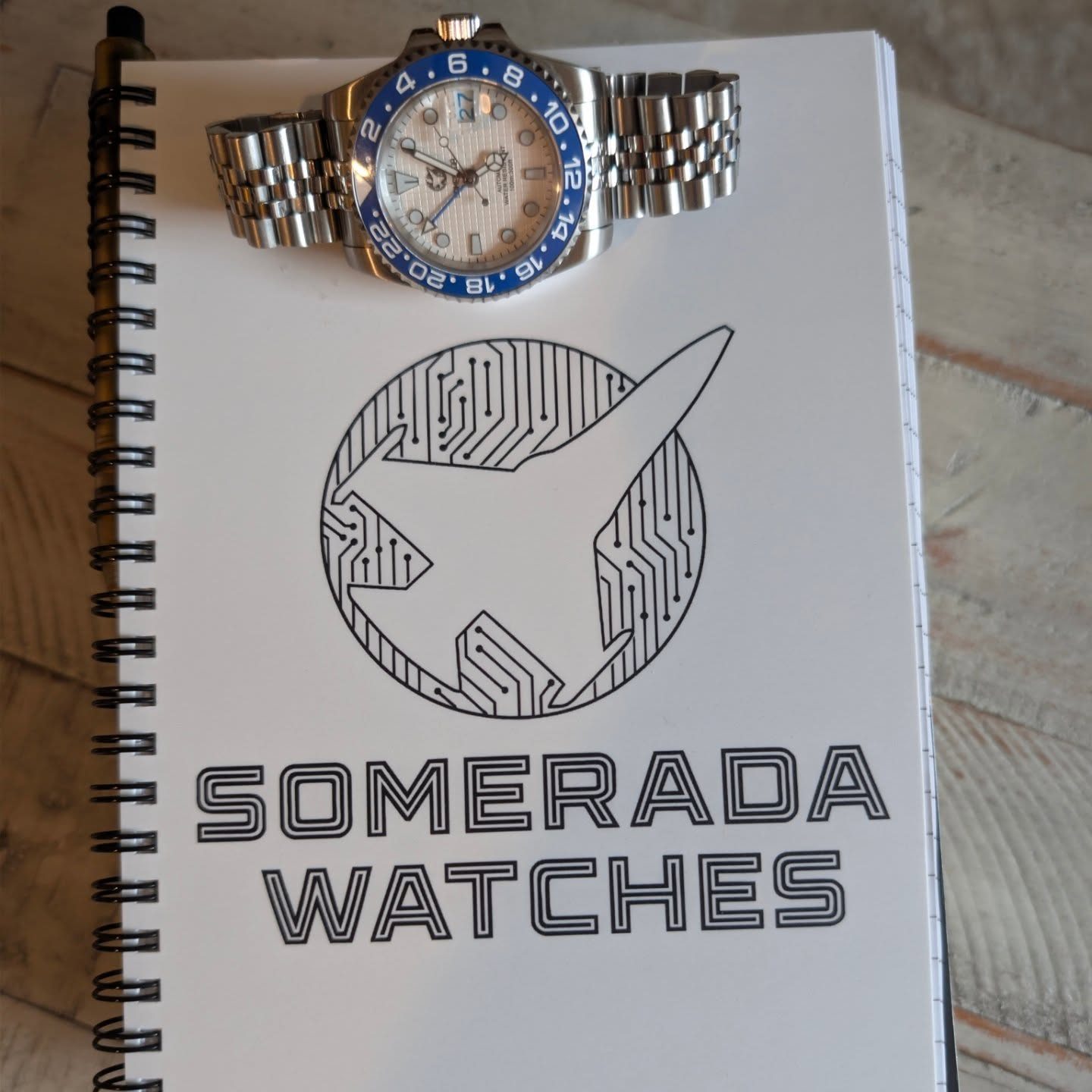 Somerada GMT with branded notebook