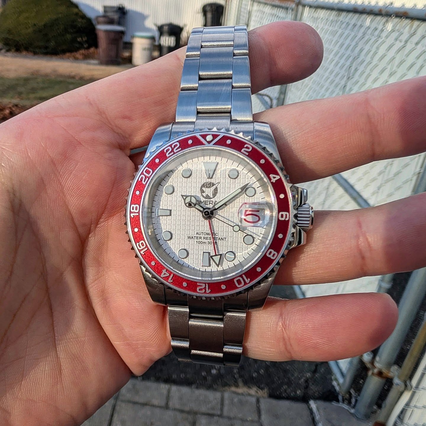 White dial GMT with red and blue Pepsi bezel
