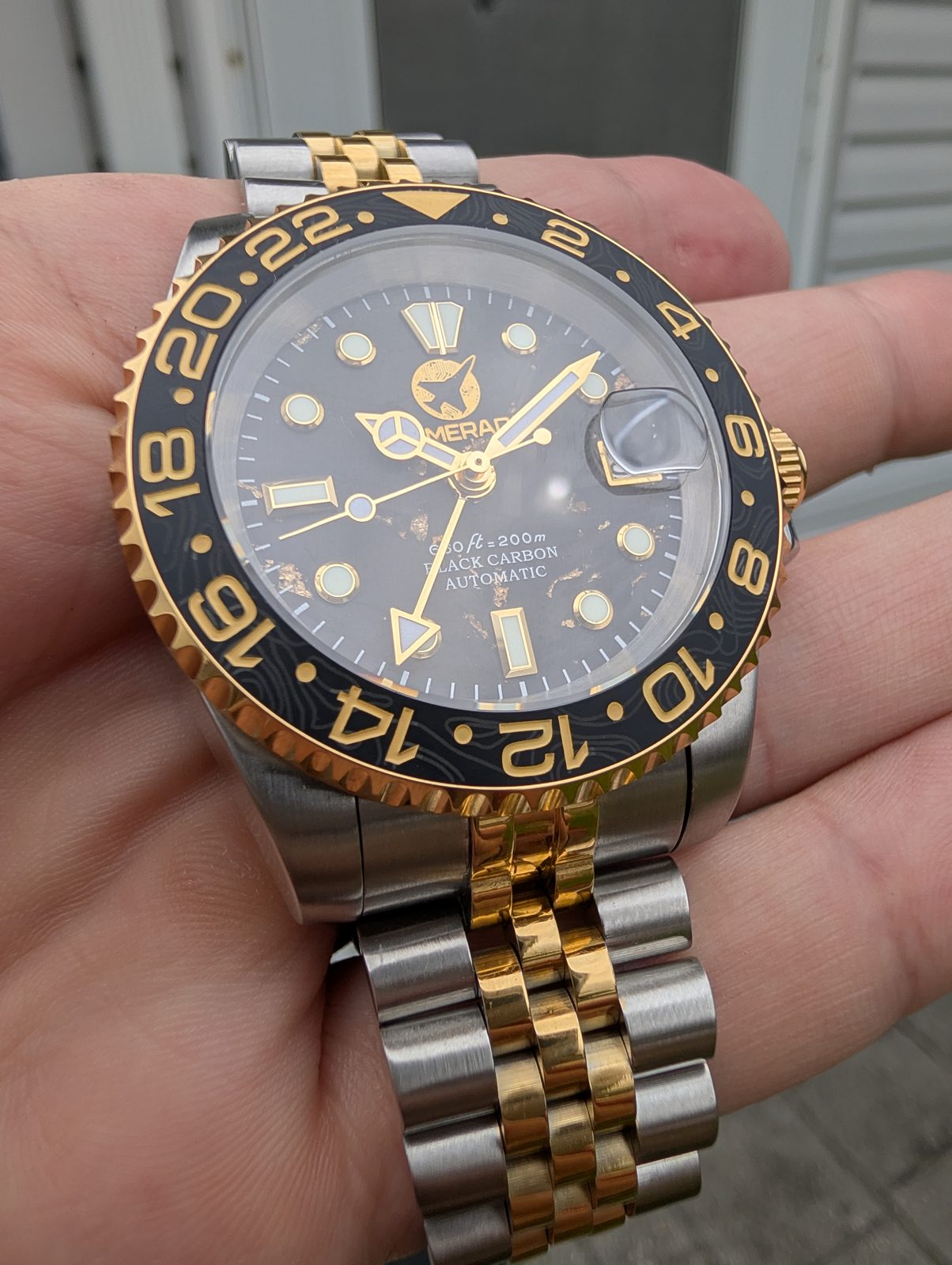 Two tone black and gold GMT on two tone bracelet